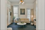 Recharge After Sunny Days by the Shore in Peach Mansion`s West-side Living Room
